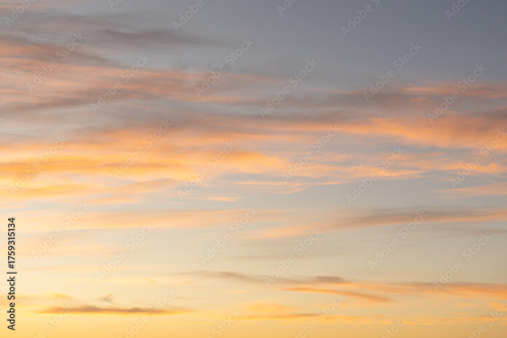 Obraz premium Sunrise with pastel colored clouds