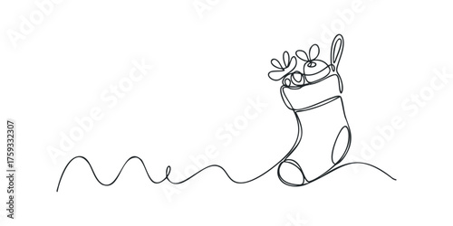 Christmas stocking with decorative top filled with gifts