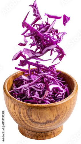 Shredded Purple Cabbage Floating Above a Wooden Bowl on a Transparent Background