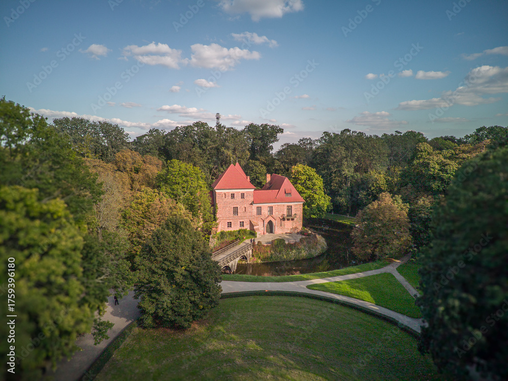 Obraz premium A brick Gothic castle in Oporow, Poland.