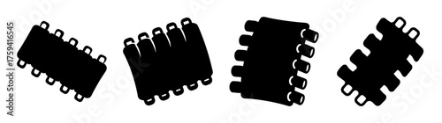 Four black jigsaw puzzle pieces scattered with white outline and soft grey background