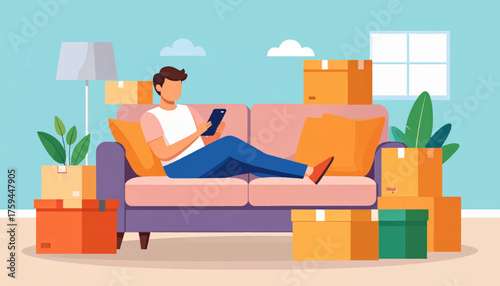 Young man relaxing on a sofa with a tablet surrounded by cardboard moving boxes in a new home.