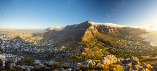 The incredible view from Lion's Head over Table Mountain, Cape Town and Camps Bay at golden hour, Cape Town, South Africa.