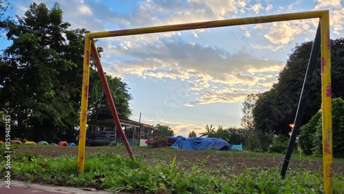 Wallpaper Mural Soccer Goal Post Against Scenic Cloudy Sky at Dusk in Rural Landscape Torontodigital.ca