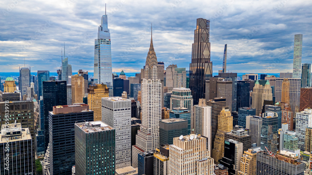 Fototapeta premium Midtown Manhattan skyline with Chrysler Building. Aerial drone photo of Midtown Manhattan skyline with the Chrysler Building and other iconic skyscrapers.