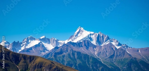Majestic Spanish Pyrenees peaks under a clear blue sky, peaks, nature
