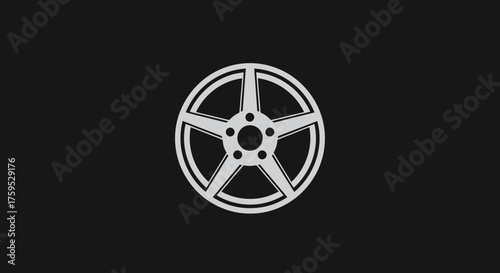 Car wheel rim with five spokes and center holes on a solid dark background
