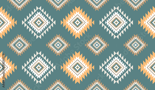 Seamless geometric ethnic pattern inspired by Native American tribal fabric. Traditional Aztec and Navajo style carpet and tile vector design on navy  background. Perfect for textile, wrapping,