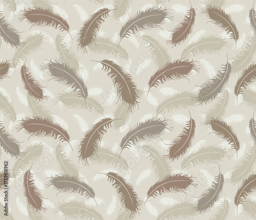 The seamless background with bird feathers.