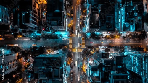 Aerial cityscape at night illuminated buildings and roads