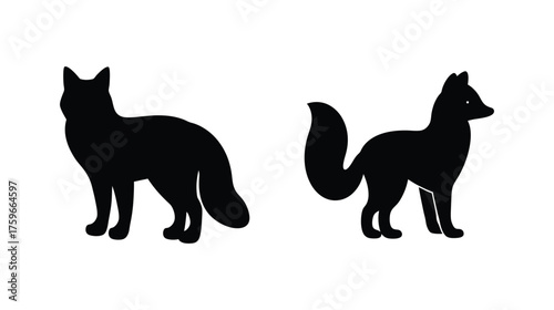 Two silhouettes of arctic foxes standing side-by-side depicting their distinctive features and graceful postures