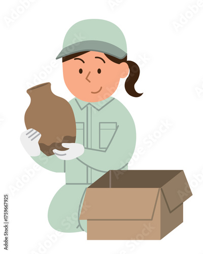 生前整理・片付けをする3/作業員の女性1