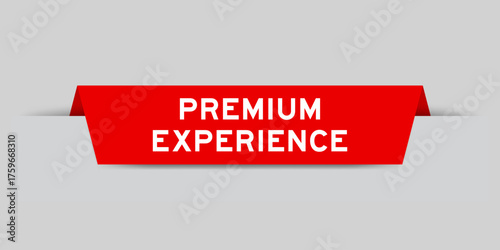 Red color inserted label with word premium experience on gray background
