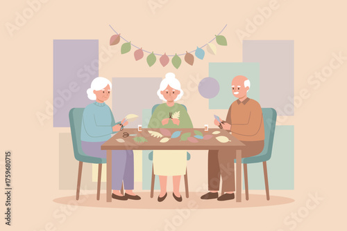 Happy seniors crafting paper leaves enjoying a creative activity together Lifestyle community leisure