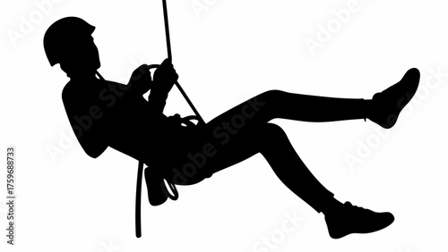 Silhouette of a climber rappelling with rope, showcasing adventure, skill, and thrilling descent for sports