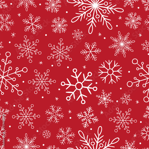 Seamless winter pattern with white snowflakes on a bright red background. Elegant festive design perfect for Christmas and New Year themes, gift wrapping, greeting cards, textiles, wallpapers, invitat