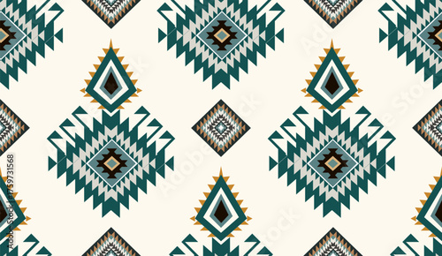 Seamless geometric ethnic pattern inspired by Native American tribal fabric. Traditional Aztec and Navajo style carpet and tile vector design on navy blue background. Perfect for textile, wrapping,
