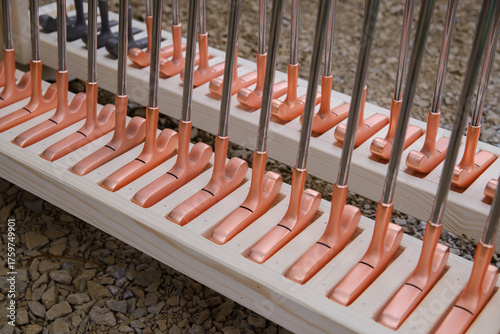 golf mallet on the green, artificial turf