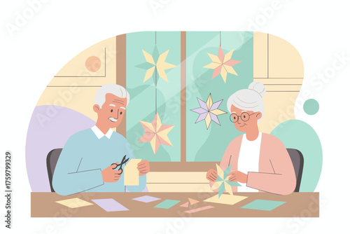 Happy senior couple crafting colorful paper stars together enjoying a creative leisure hobby
