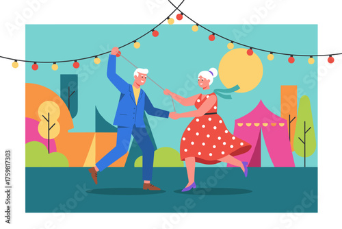 Happy senior couple dancing with festive lights outdoors at a joyful community event