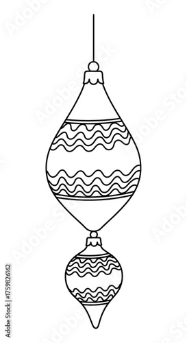 A festive holiday ornament with wavy stripes hanging from a string for Christmas celebration.