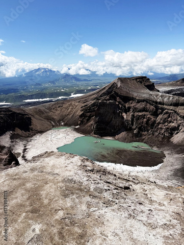 Volcanic Crater Lake under a Clear Blue Sky