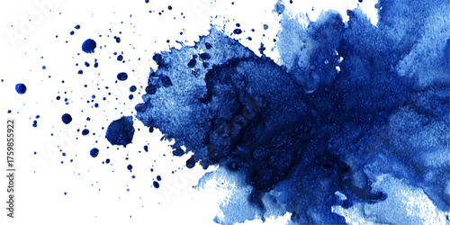 Abstract explosion of deep blue ink spreading and splashing on a white background