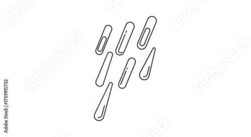 Abstract Composition of Several Paperclips in a Downward Pattern Against a Black Background