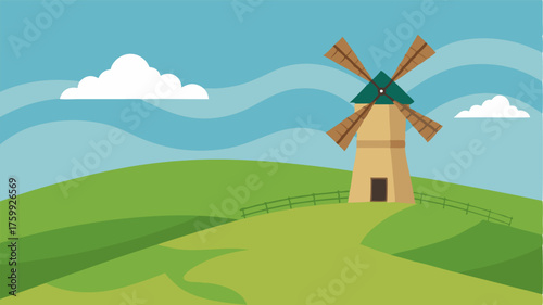 A lone windmill standing tall on a hill its sails spinning lazily in the breeze.