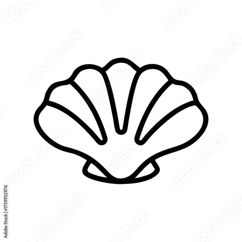 A black and white image of a cat sitting on a wooden surface