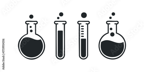 Scientific glassware collection with bubbling liquid