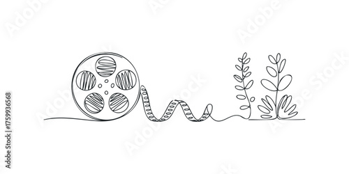 Film reel with developing film and plant graphics