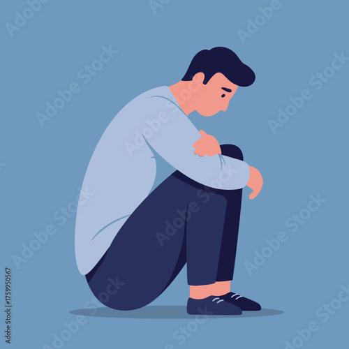 Flat vector illustration of a lonely, depressed, or sad man sitting huddled on the floor with his knees drawn up, symbolizing isolation, mental distress, or grief on a monochromatic blue background