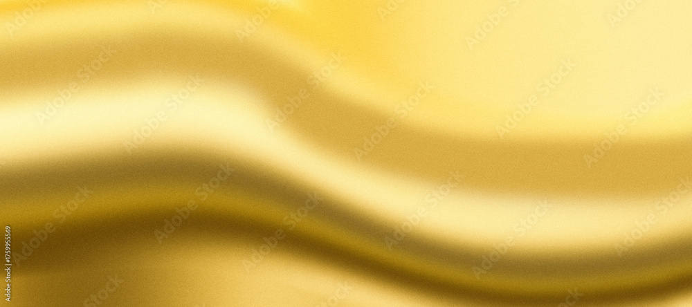 Fototapeta premium Golden fabric with soft folds creating a luxurious and elegant backdrop