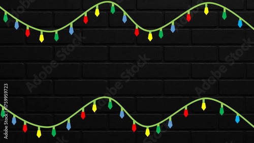 Christmas lights on a black brick wall background
