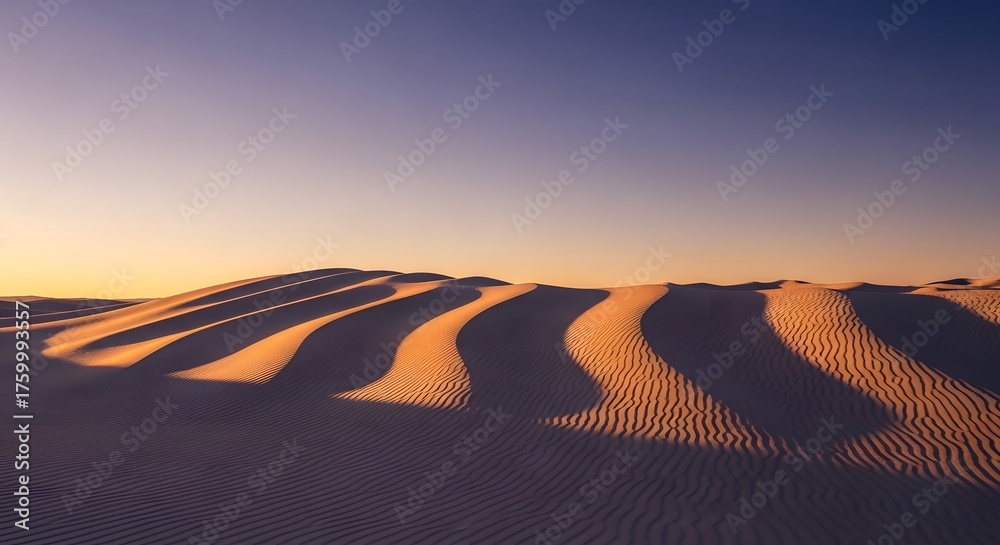 Naklejka premium Photo of golden hour light casts dramatic shadows across rippling sand dunes in a vast desert landscape