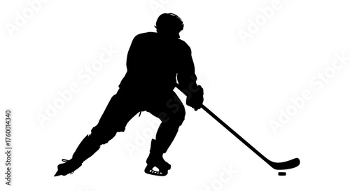 Silhouette of a hockey player skating with a stick