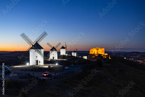 Consuegra La Mancha windmills and castle at twilight