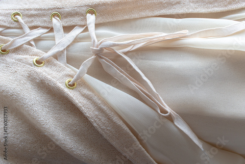 A fabric and mercerized texture background, tulle lace and ribbon lace