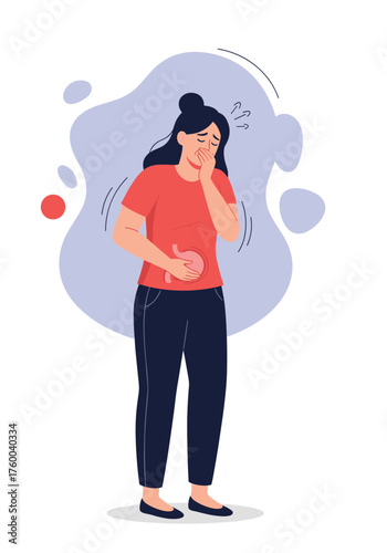 A young woman experiences discomfort and pain in her stomach region.