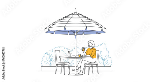 A person enjoying a beverage at a table under a large umbrella surrounded by greenery.