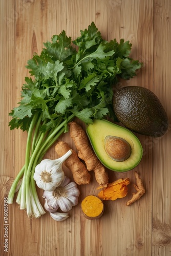 Avocado, garlic, ginger and fresh herbs. Set for fresh salad.