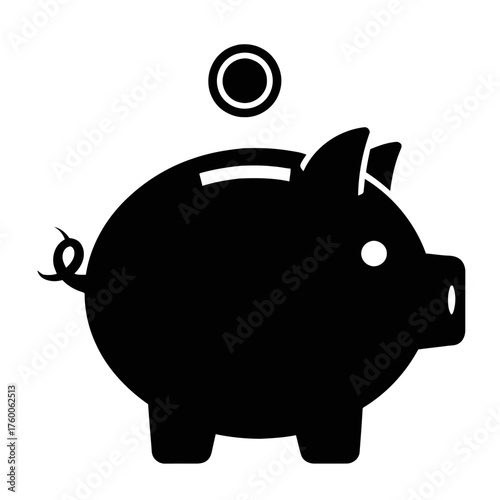 A black piggy bank with a coin falling into its slot, isolated on a white background.