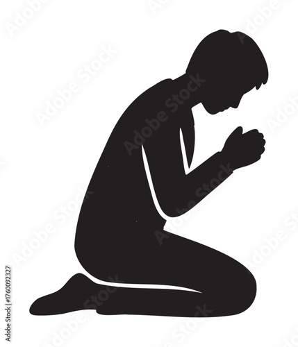 Silhouette of a male figure kneeling with hands clasped in prayer, conveying devotion and spirituality.