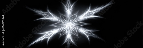 Delicate snowflake with intricate patterns radiates light, set against a dark backdrop, showcasing beauty and uniqueness in winters artistry.