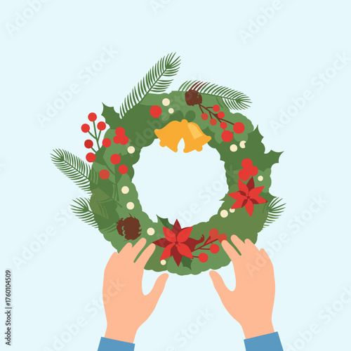 Festive Christmas Wreath Decoration with Hands