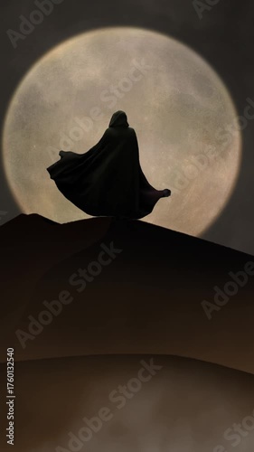 Vertical Hooded Figure Desert Moon Sandstorm 4K Loop features the silhouette of a person in a hooded moving cloak standing on a sand dune with a full moon in a vertical ratio loop.
