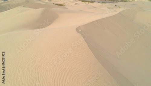 Fototapeta Naklejka Na Ścianę i Meble -  Aerial View of Warm Beige Sand Dunes with Repeating Micro-Ripples