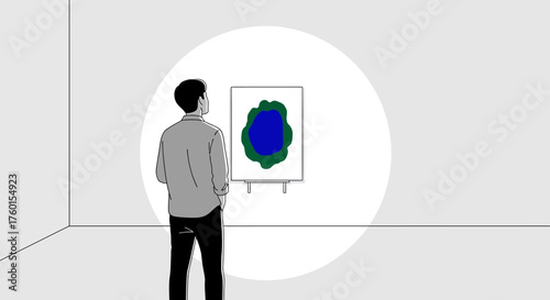 Man admiring abstract art in a gallery spotlight.