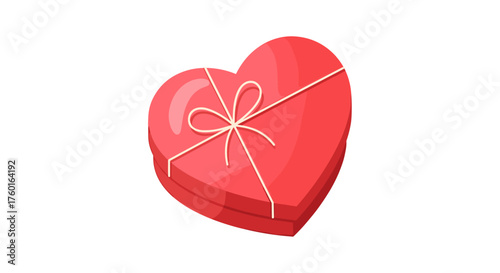 A heart-shaped gift box with a ribbon tie is ready to be given.